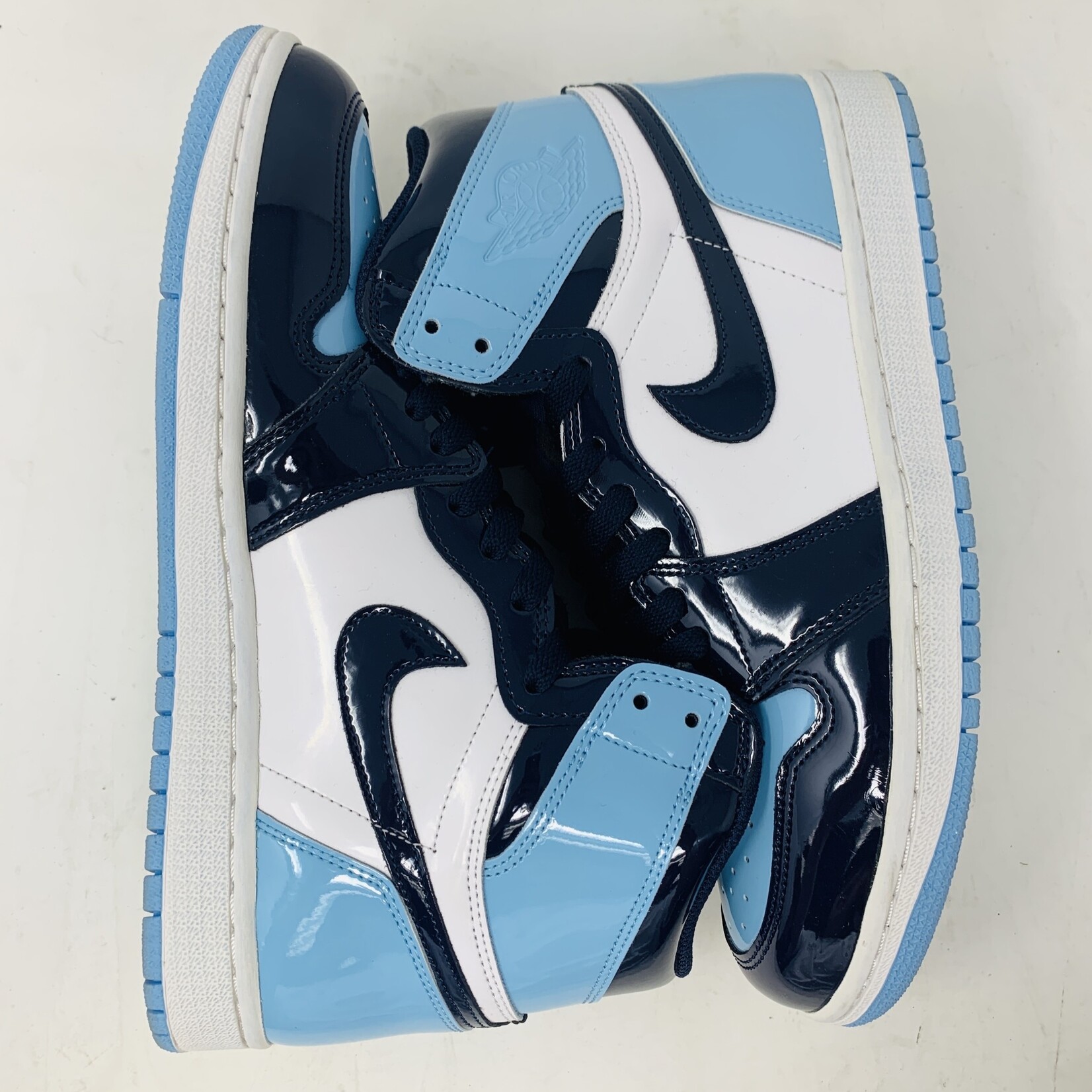 Jordan 1 Retro High UNC Patent Women s Holy Ground Sneaker Shop Buy Sell Trade Sneakers