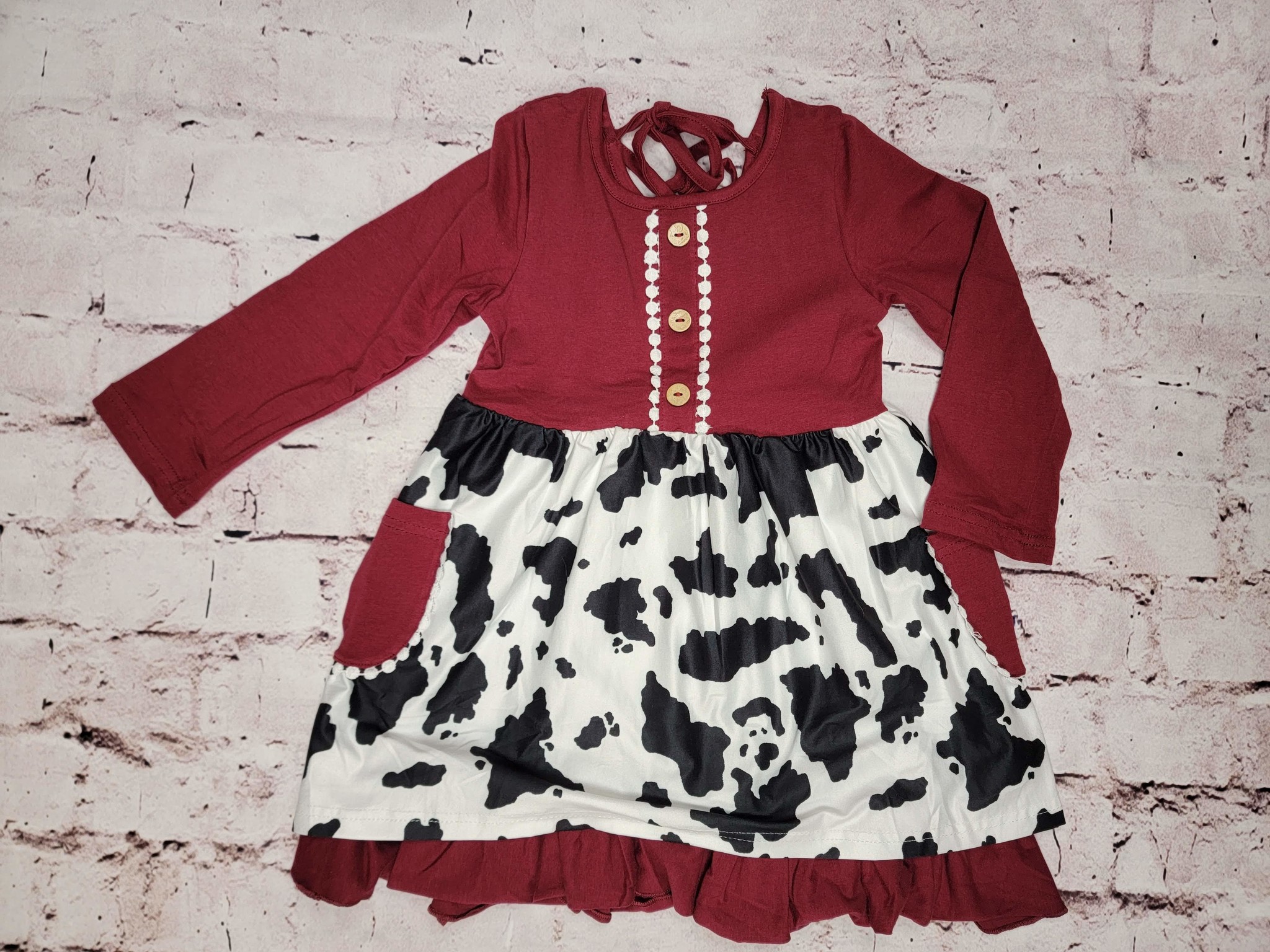 Cowprint Tie Back Ruffle Dress