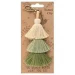 THE WORLD NEEDS WHAT YOU GOT TASSEL CLIP