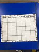 Black Painted Dots on White Calendar Chart
