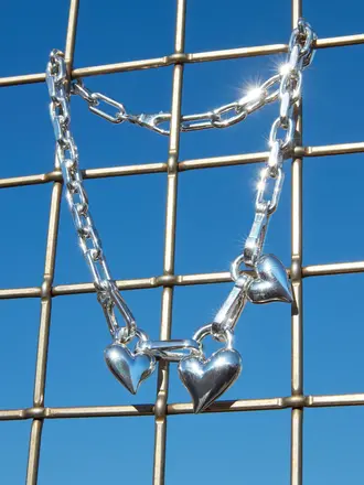 Jenny Bird Padlock triple heart pendant necklace silver