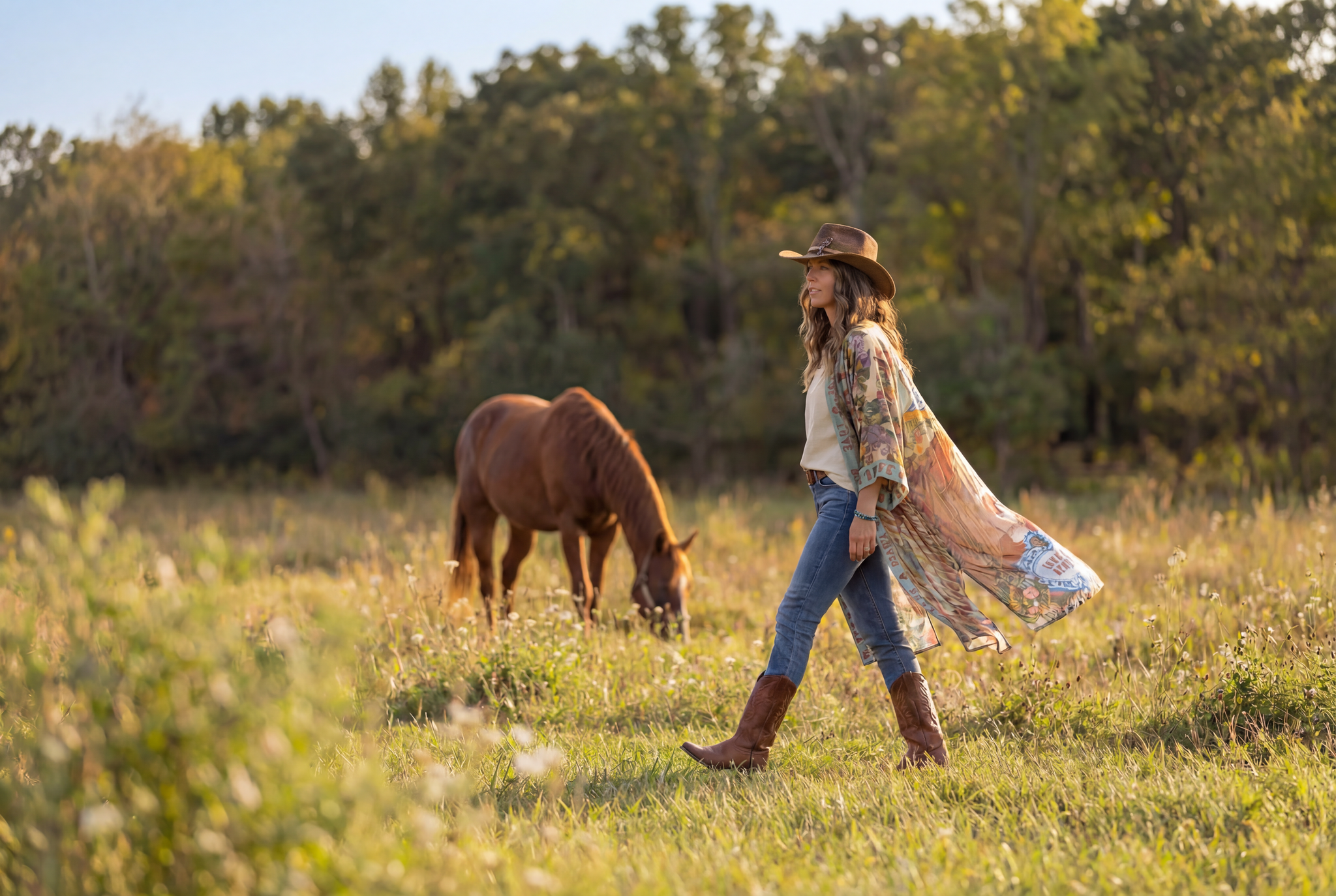 woman walking in field with horse wearing the market of Stars Love language kimo