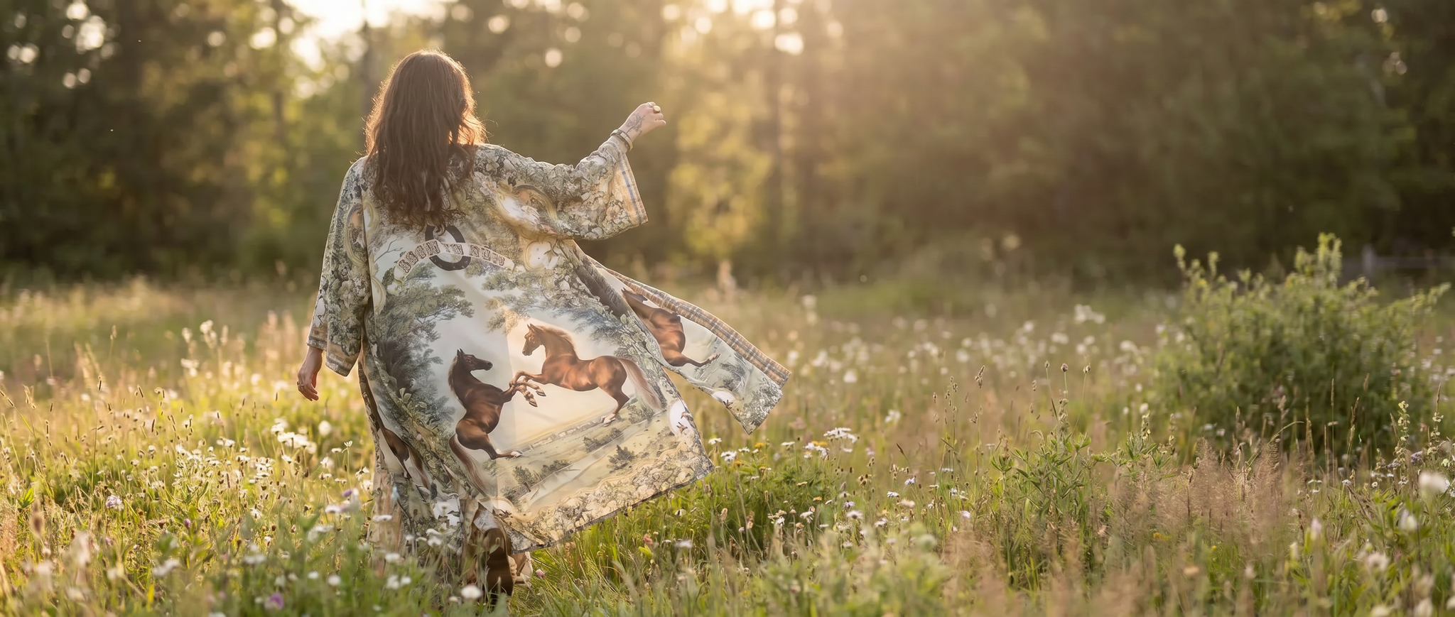 woman in field wearing a born to run opera duster kimono from market of stars