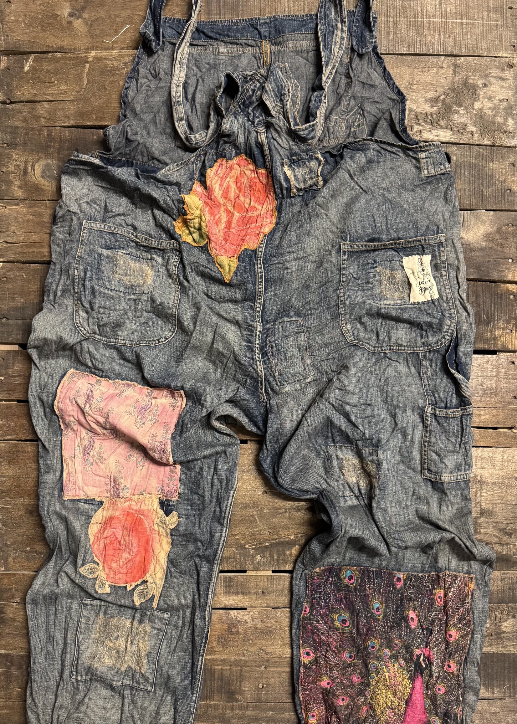 https://cdn.shoplightspeed.com/shops/657667/files/76688051/1652x2313x1/house-of-jaded-gypsy-sunfaded-trail-love-overalls.jpg