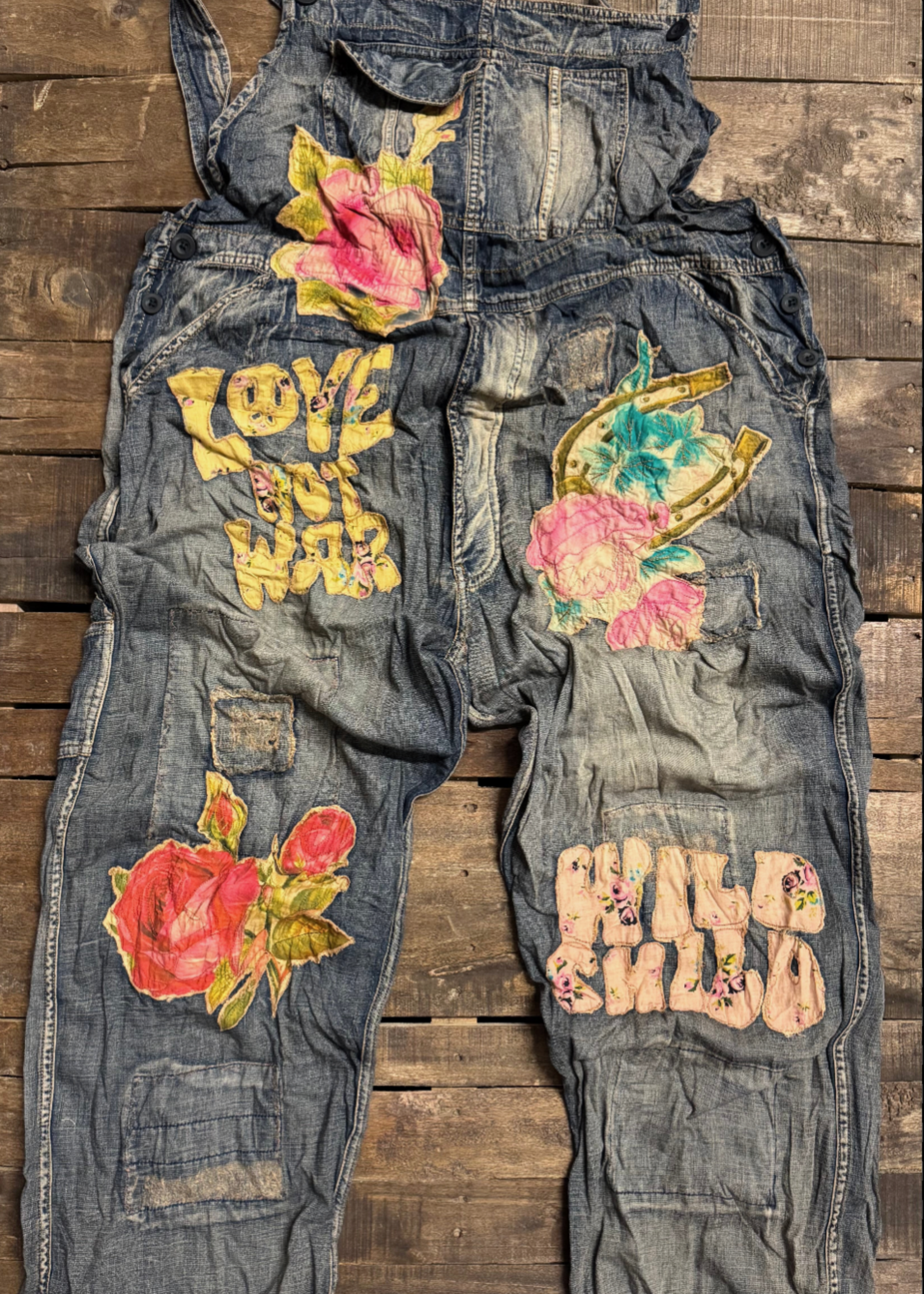 https://cdn.shoplightspeed.com/shops/657667/files/76688052/1652x2313x1/house-of-jaded-gypsy-sunfaded-trail-love-overalls.jpg