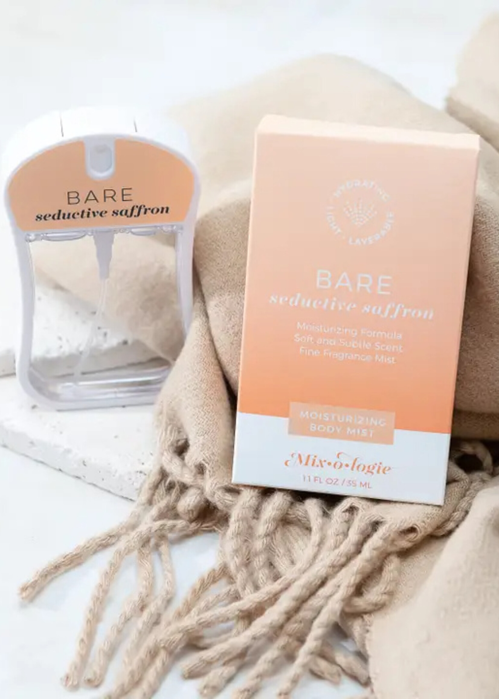 https://cdn.shoplightspeed.com/shops/657667/files/76737144/1652x2313x1/mixologie-moisturizing-body-mist-perfume.jpg