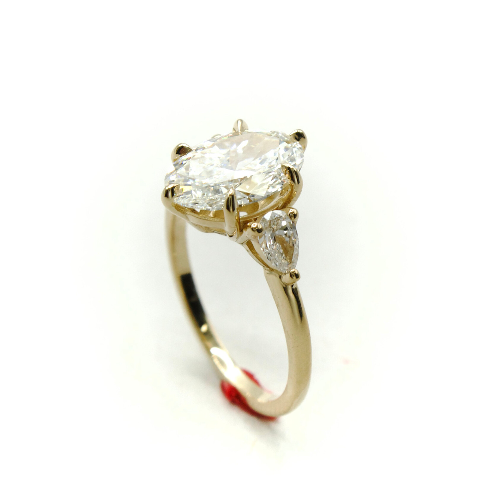 Mckay Diamonds LG Oval with Pear Side StonesLab-Grown Oval Diamond Ring with Pear Side Stones