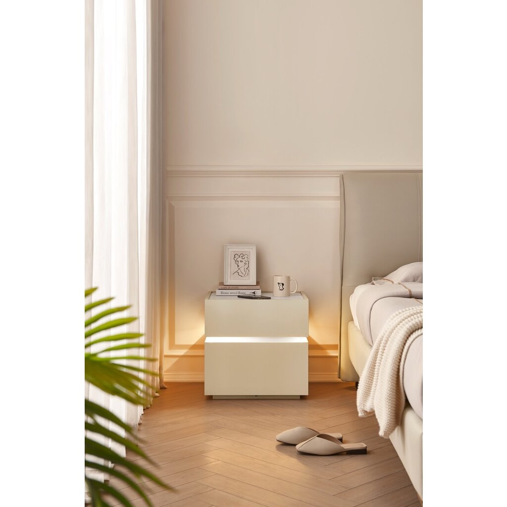 Table de chevet avec éclairage et dessus en pierre frittée polie