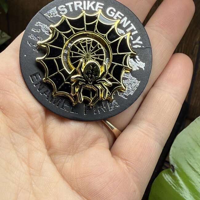Spinning Spider Pin by Strike Gently