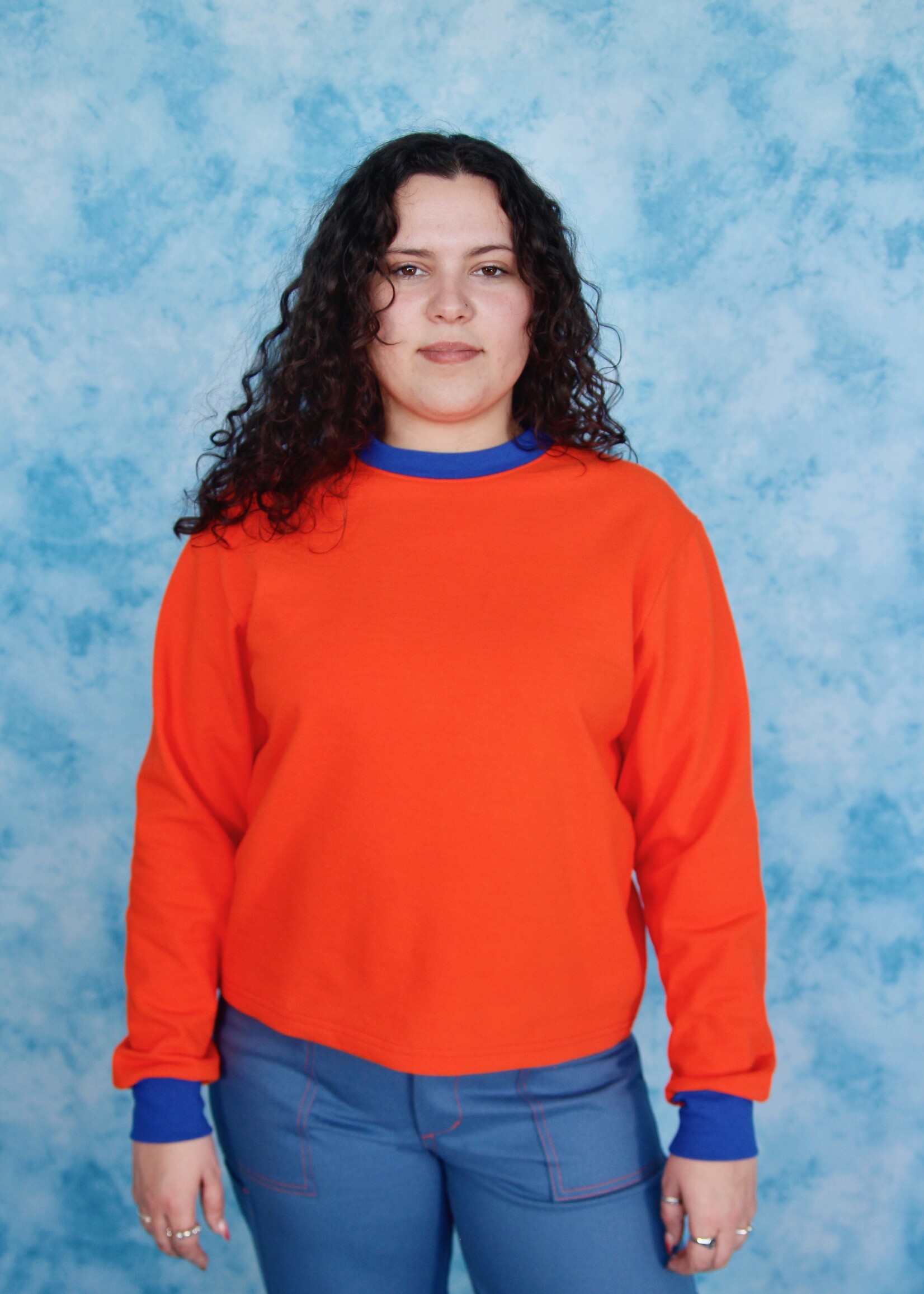 Studio Citizen Studio Citizen Crewneck Sweater Flat Hem in Orange with Blue Rib