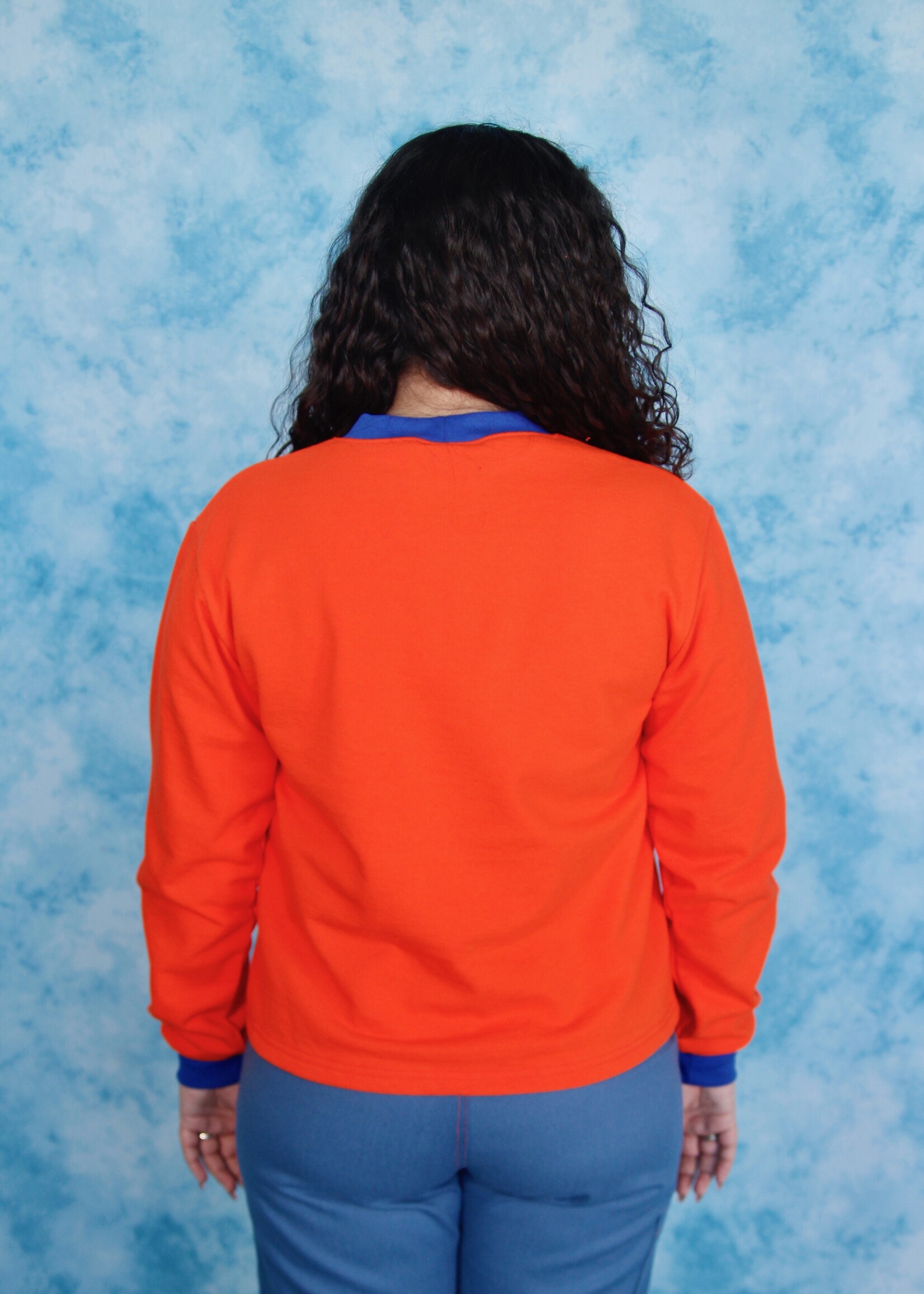 Studio Citizen Studio Citizen Crewneck Sweater Flat Hem in Orange with Blue Rib