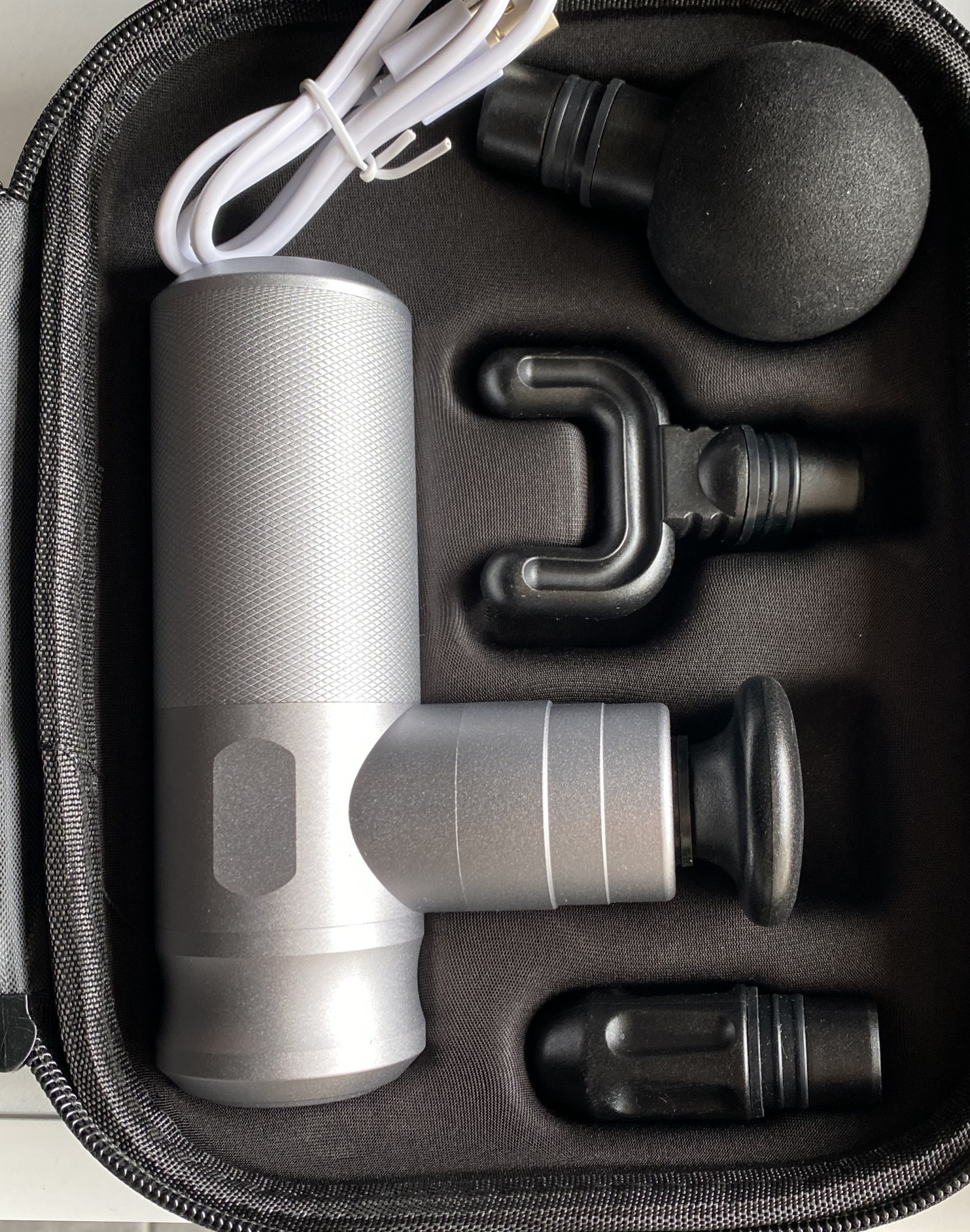 Percussion massage gun