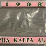 ΑΚΑ AKA Pink and Green License Plate