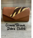 W Safari Clutch Collection (FA25)