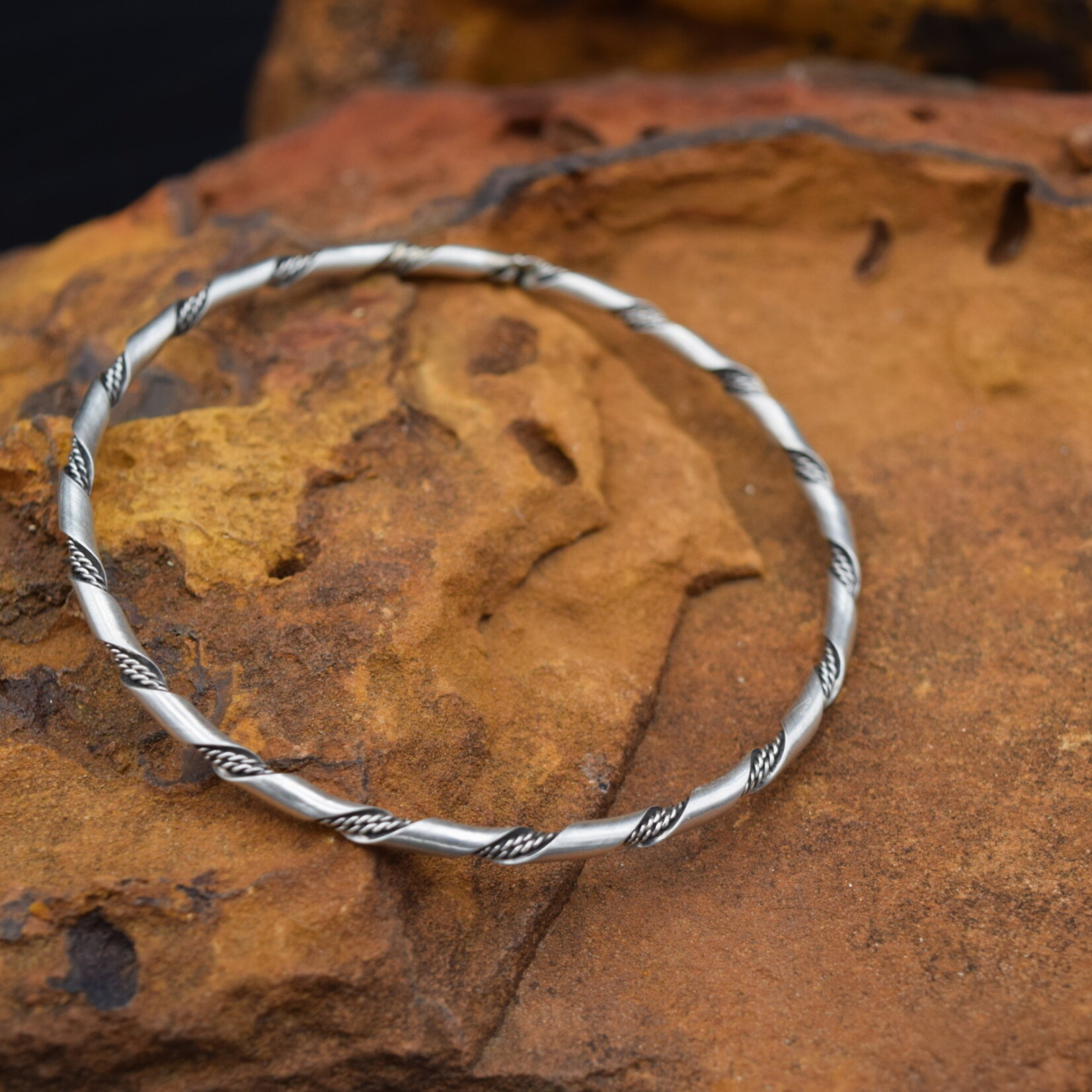 SILVER TWIST BANGLE BRACELET