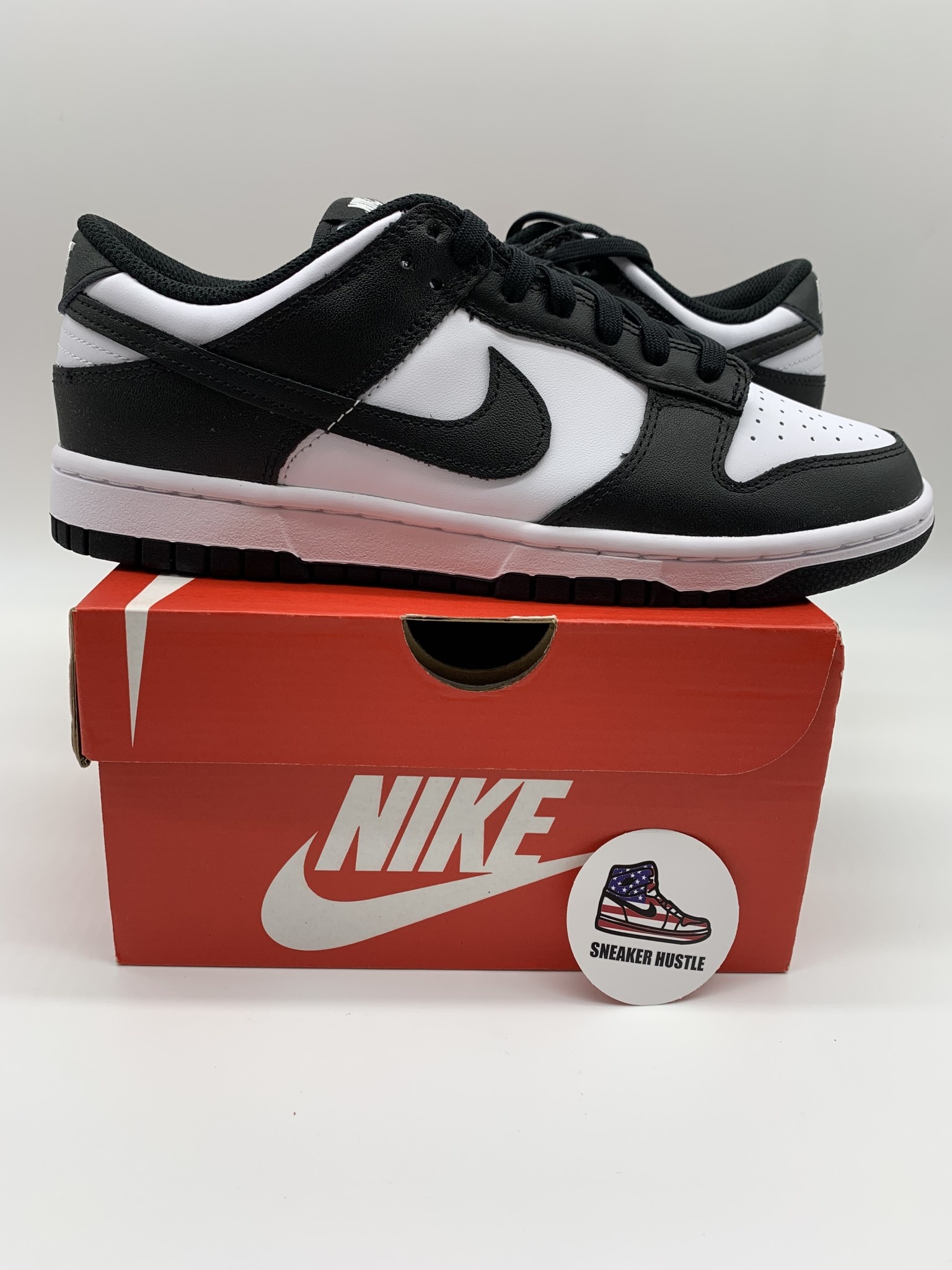 black and white dunks low 2021