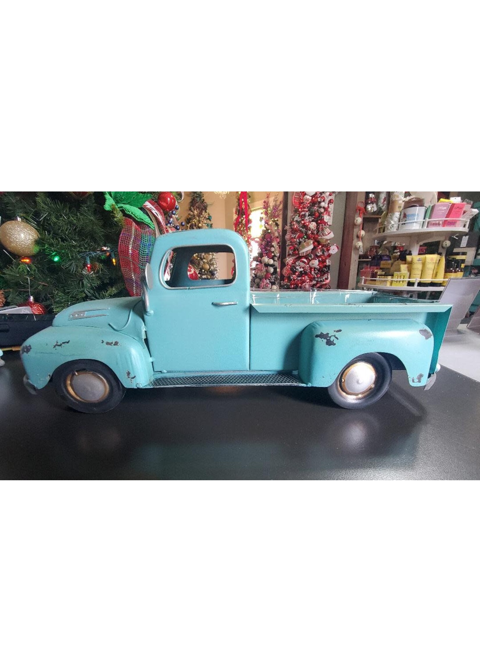 Gary's Wholesale Light Teal Metal Truck