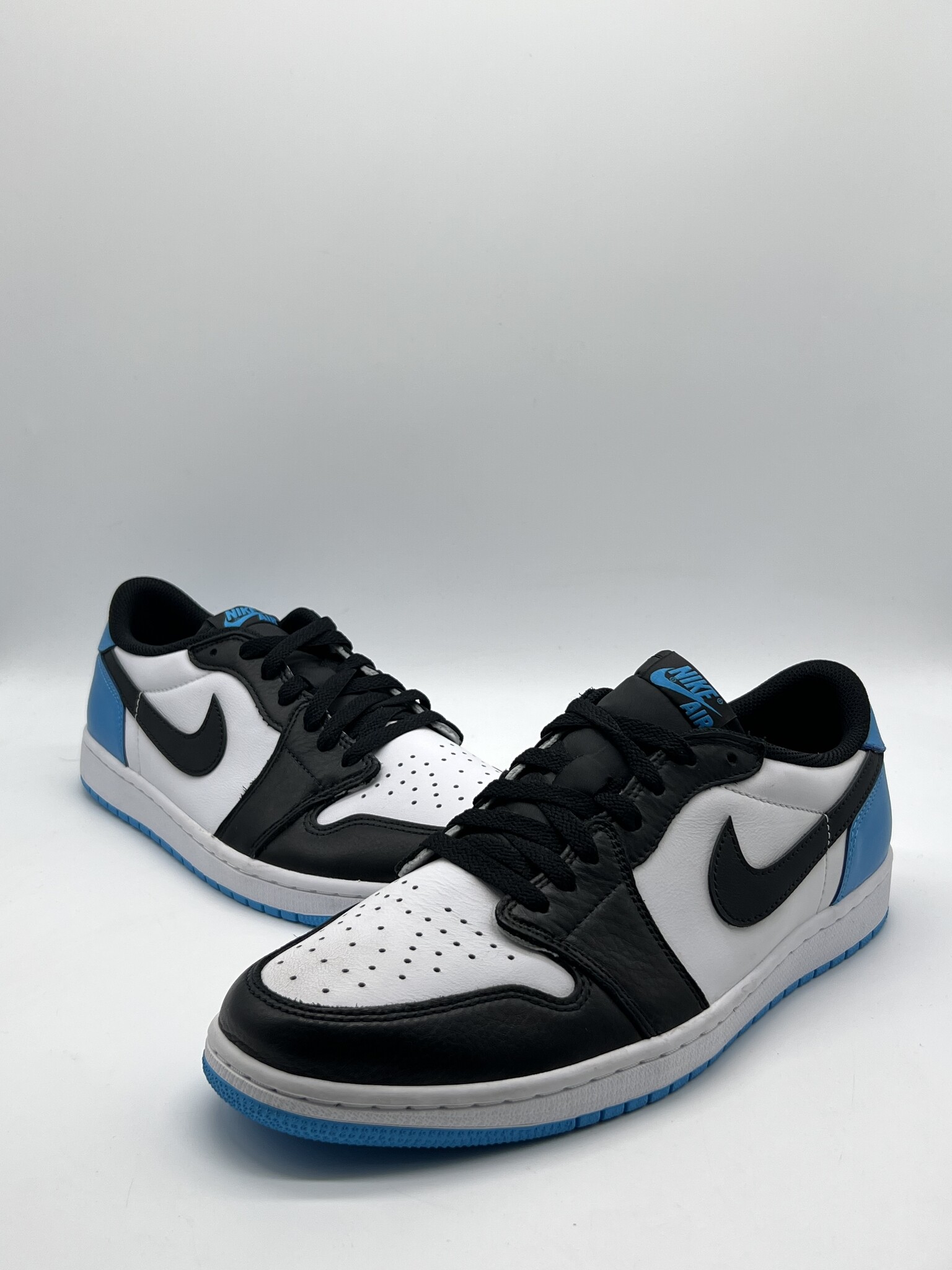 Jordan 1 Retro Low OG Black Dark Powder Blue - Diverse Sole
