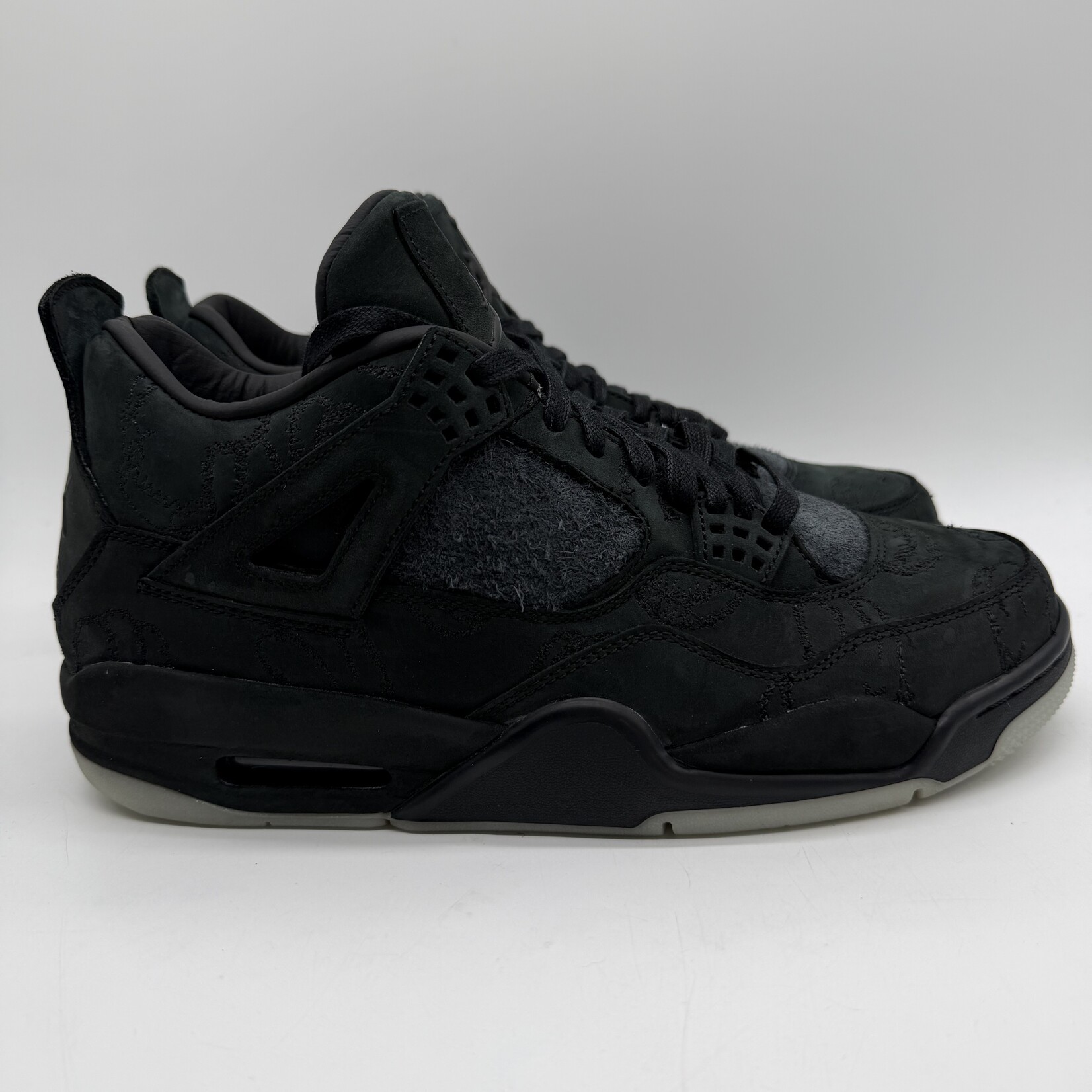 Jordan 4 Retro Kaws Black