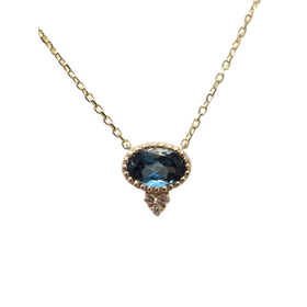 PARAGON COUTURE (R) 14K .60BT .03DIA YELLOW GOLD PENDANT BLUE TOOPAZ AND DIAMOND