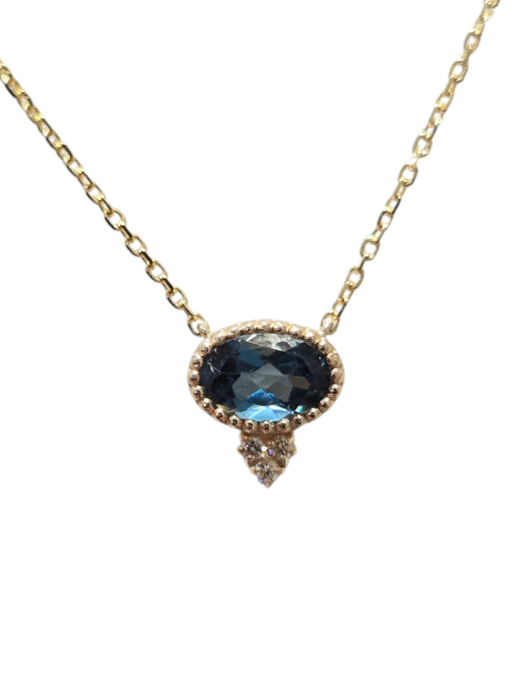 PARAGON COUTURE (R) 14K .60BT .03DIA YELLOW GOLD PENDANT BLUE TOOPAZ AND DIAMOND