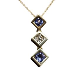 (Y) 14K TANZ AND DIA JOURNEY PENDANT