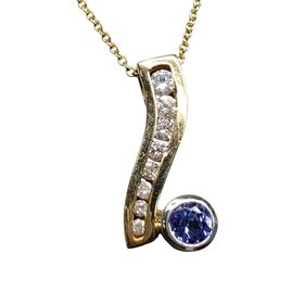 (R) 14KY .28CT TANZANITE .23TDW