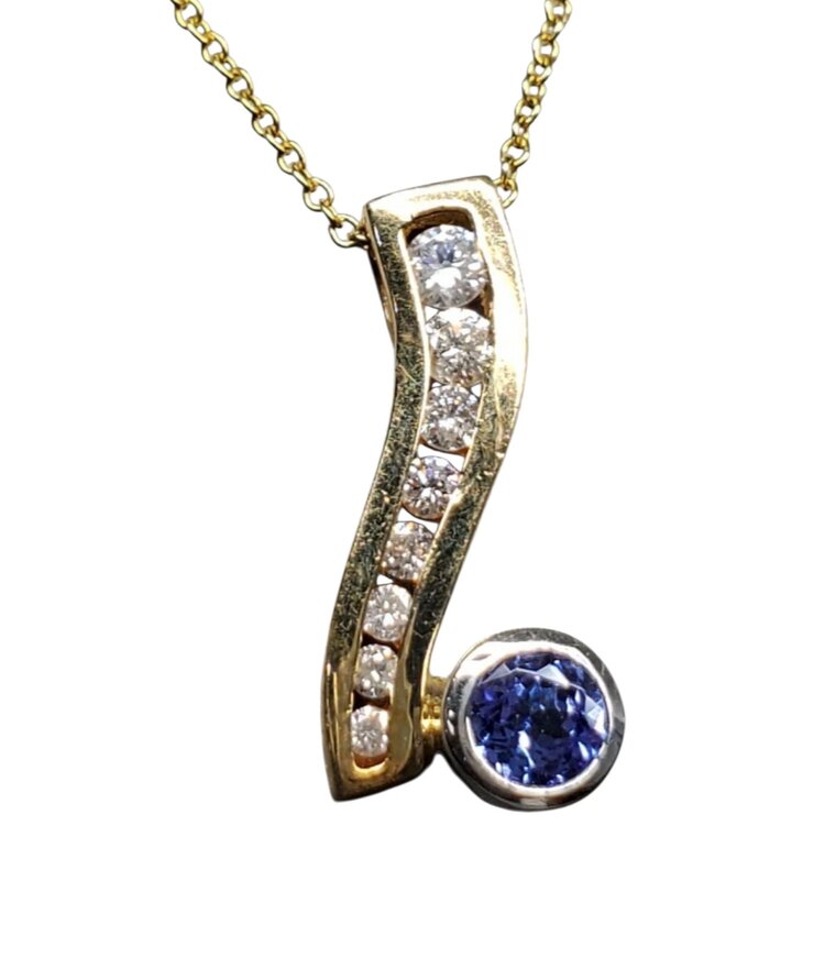 (R) 14KY .28CT TANZANITE .23TDW