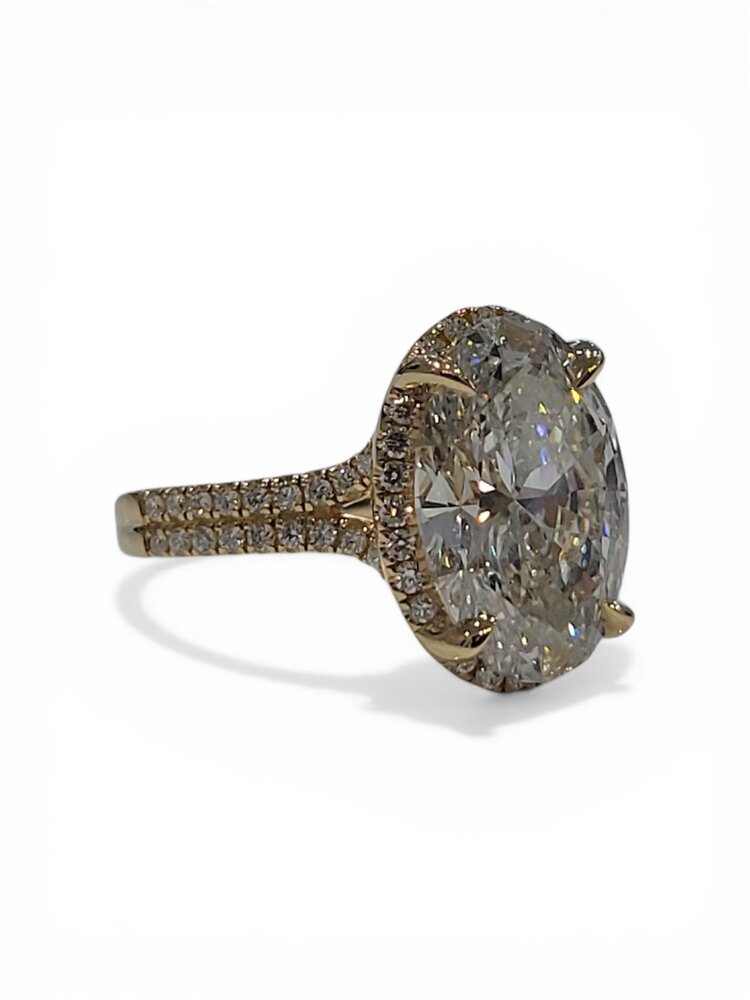 DIAMOND TRADERS INTERNATIONAL (Y) 14K 5.60CT SI1 G OVAL LG CENTER .50CT SPLIT SHANK ENGAGEMENT RING IGI LG607327041