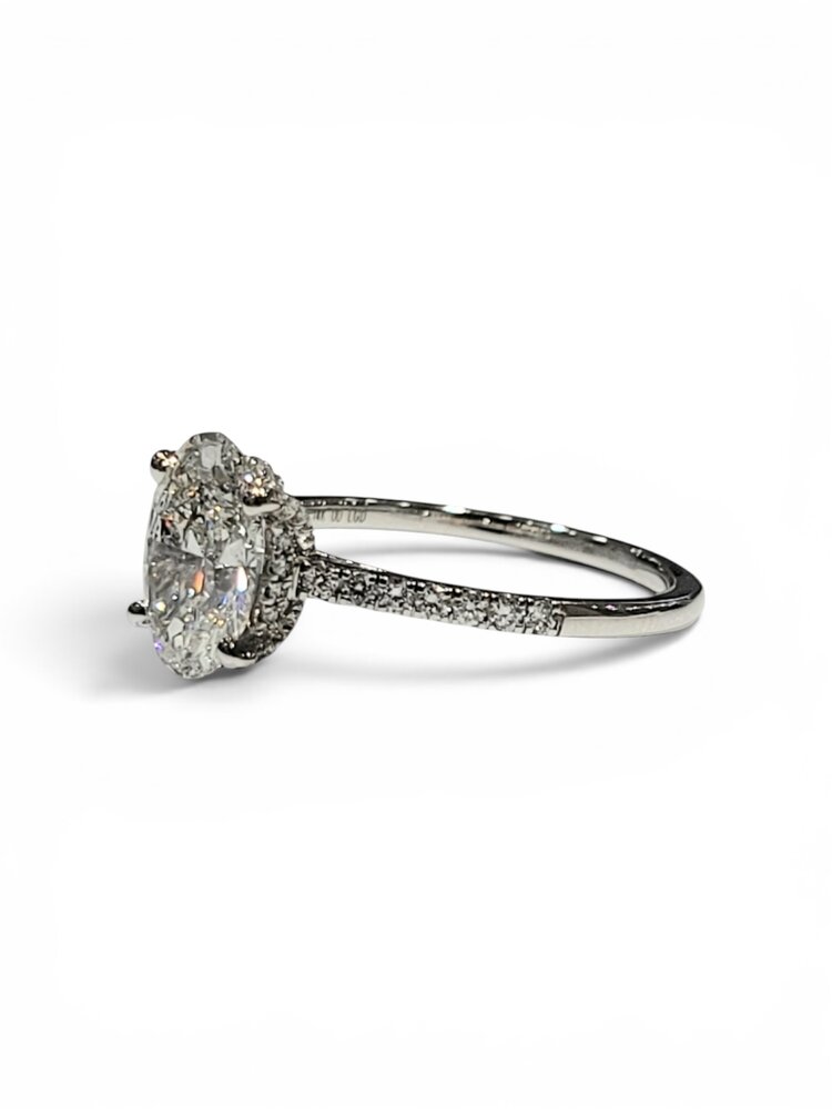 DIAMOND TRADERS INTERNATIONAL (X) 14KW 2.00CTW OVAL LAB GROWN DIAMOND 1.75CT CENTER STONE, 2.00CTW HIDDEN HALO, STRAIGHT LINE DIAMOND SHANK, DIAMOND STUDDED PRONG
