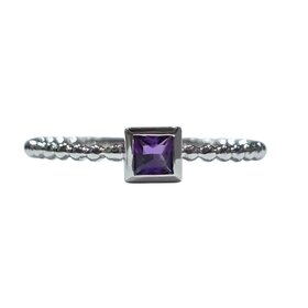 DIAMOND TRADERS INTERNATIONAL (X) 14KW .15CT AMETHYST PR CUT BEADED SHANK RING