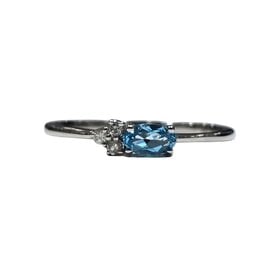 DIAMOND TRADERS INTERNATIONAL (X) 10KW BLUE TOPAZ .04CT DIAMOND ACCENTED RING