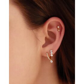 ANIA HAIE Gold Trio Sparkle Huggie Hoop Earrings, Material: 925 Sterling Silver with 14kt Gold Plating with Cubic Zirconia • Hoop Diameter: 6.5mm • Hoop Width: 1.6mm • Weight: 1.3g