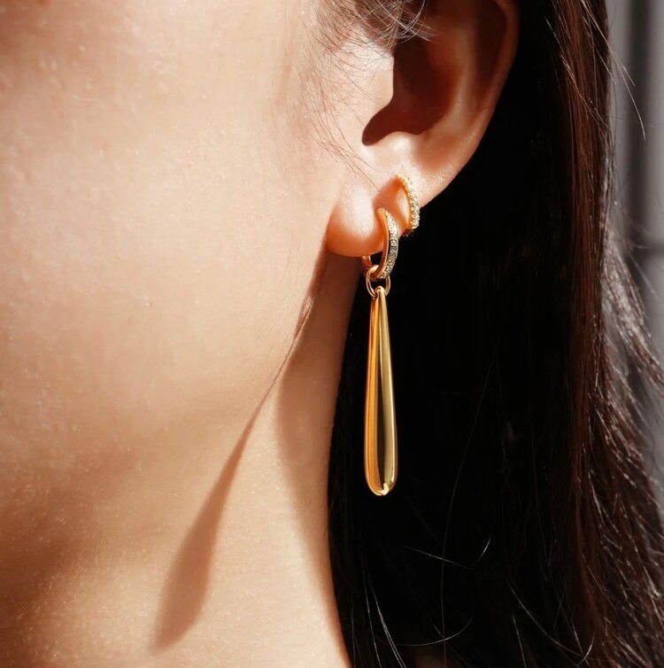 Gold Long Water Droplet Drop Earrings Material: 925 Sterling Silver with 14kt Gold Plating with Cubic Zirconia  Earring Size: 9 x 2.6mm Weight: 6.5g