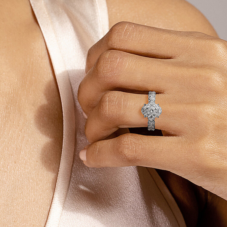 MR BRACELET (Z) 14K 4.05OV LAB 1.64MT , WHITE GOLD LAB GROWN DIAMOND BRIDAL RING, OVAL 4.05CT E VS1 IGI CERT# LG780648078 CENTER WITH 10 OVAL SIDE DIAMONDS, HIDDEN HALO SIDEVIEW
