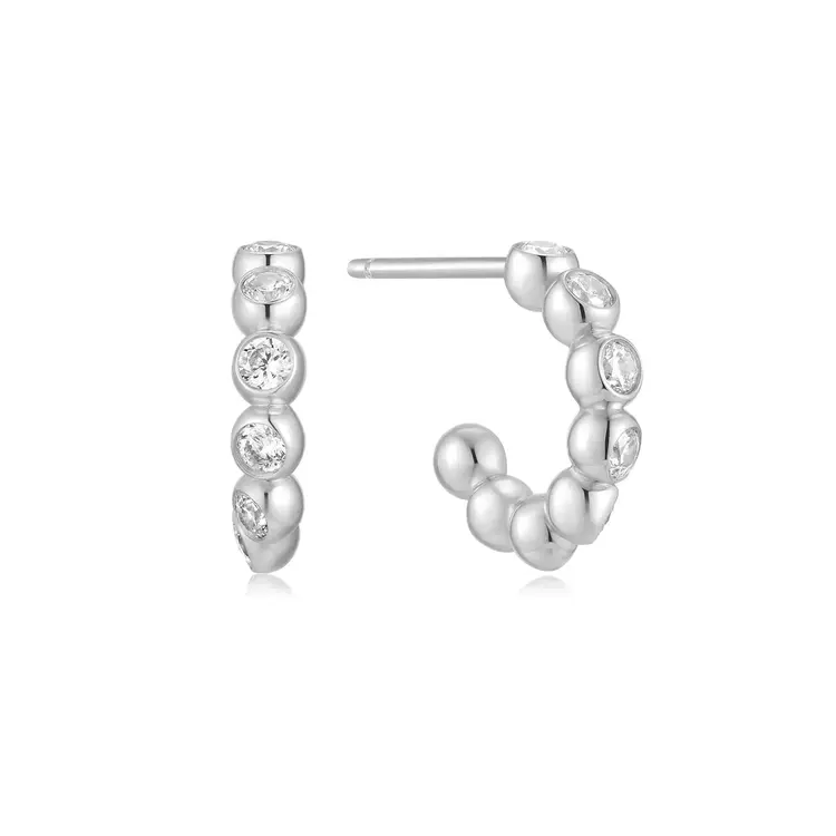ANIA HAIE Silver Bezel Beaded Huggie Hoop Earrings  Material: 925 Sterling Silver with Rhodium Plating with Cubic Zirconia  Earring Size: 6.5 x 2.7mm  Weight: 2.0g