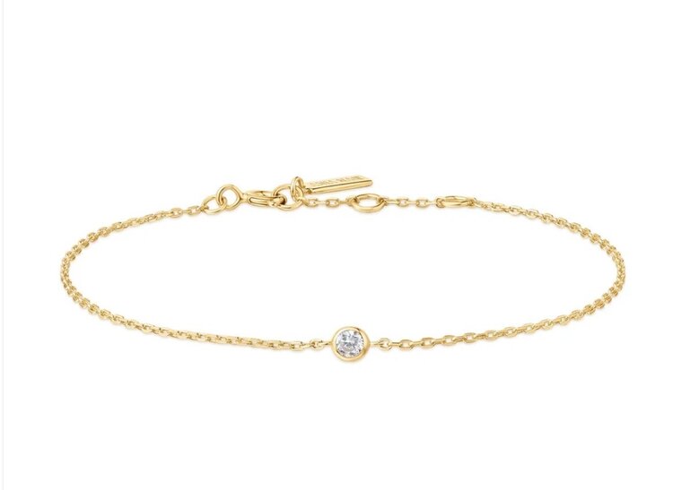 ANIA HAIE Gold Sparkle Bezel Bracelet • Material: 925 Sterling Silver with 14kt Gold Plating with Cubic Zirconia • Bracelet length: 165mm with 20mm extender • Weight: 1.1g