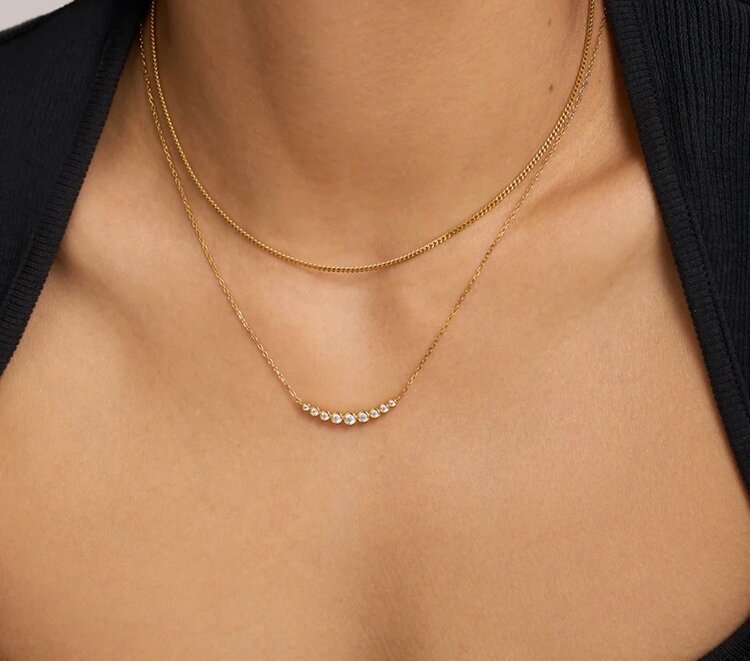 ANIA HAIE Gold Graduated Bezel-Set Necklace • Material: 925 Sterling Silver with 14kt Gold Plating with Cubic Zirconia • Necklace Length: 405mm with 50mm extender • Weight: 2.6g