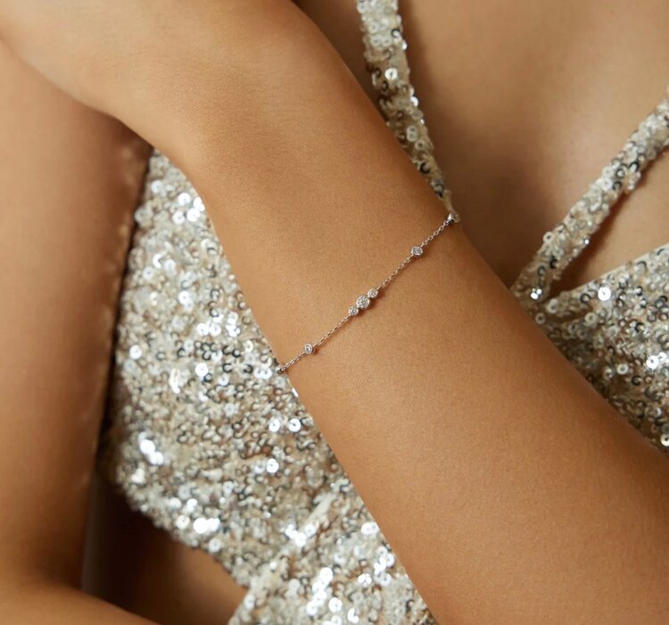 ANIA HAIE Silver Sparkling Bezel Cubic Zirconia Station Bracelet • Material: 925 Sterling Silver with Rhodium Plating with Cubic Zirconia • Bracelet length: 165mm with 20mm extender • Weight: 1.9g