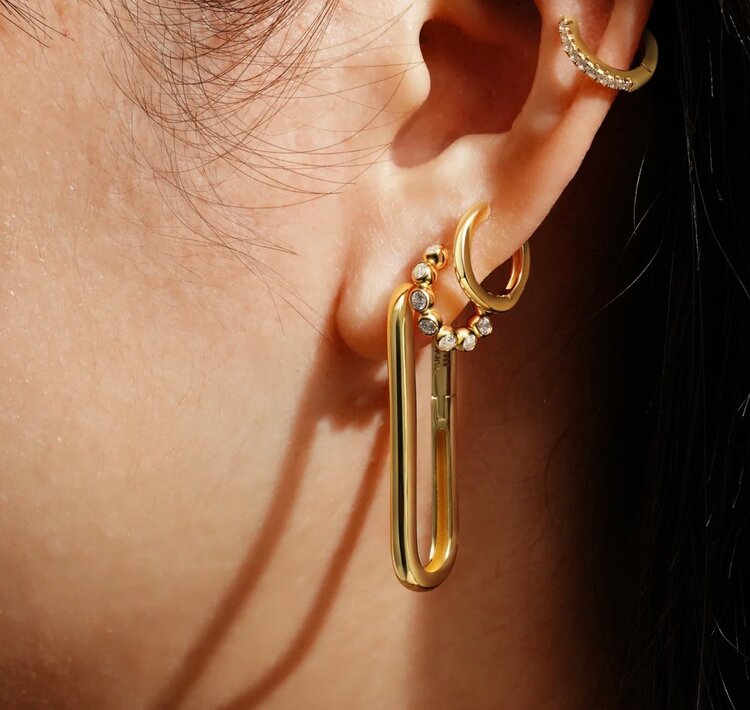 ANIA HAIE Gold Bezel Beaded Huggie Hoop Earrings  Material: 925 Sterling Silver with 14kt Plating with Cubic Zirconia • Earring Size: 6.5 x 2.7mm • Weight: 2.0g