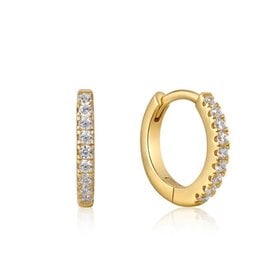 ANIA HAIE Gold Sparkle Huggie Hoop Earrings  Material: 925 Sterling Silver with 14kt Plating with Cubic Zirconia • Hoop Size: 12mm • Weight: 1.2g