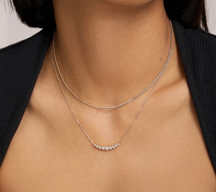 ANIA HAIE Silver Graduated Bezel Set Necklace • Material: 925 Sterling Silver with Rhodium Plating and Cubic Zirconia• Necklace length: 405mm with 50mm extender • Weight: 2.6g