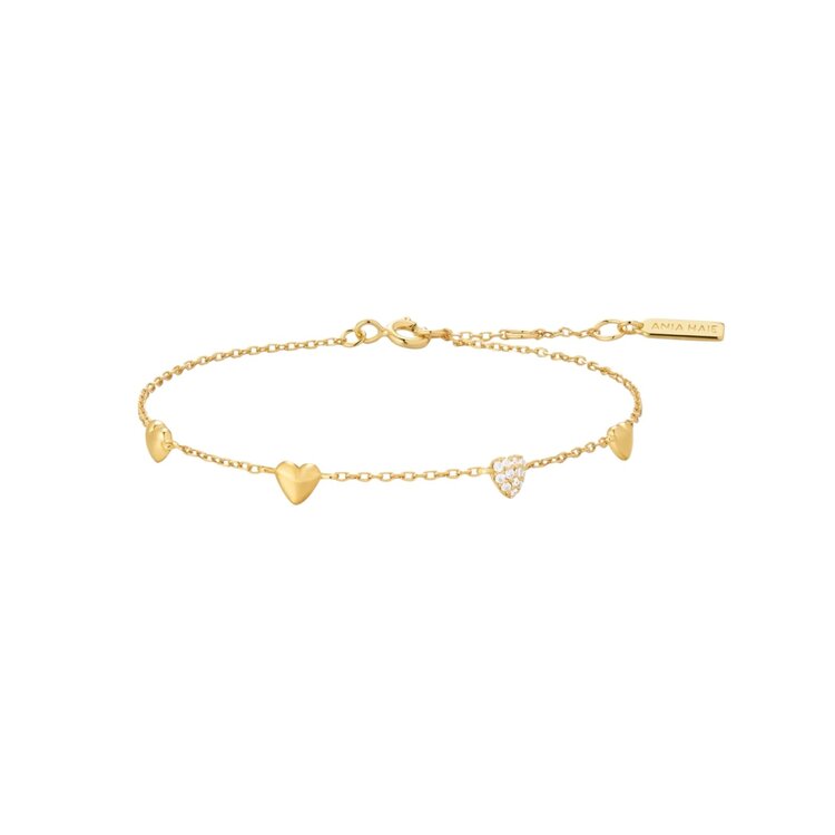 ANIA HAIE Gold Pave Puffed Heart Station Bracelet • Material: 925 Sterling Silver with 14kt Gold Plating with Cubic Zirconia • Bracelet length: 165mm with 20mm extender • Weight: 1.7g