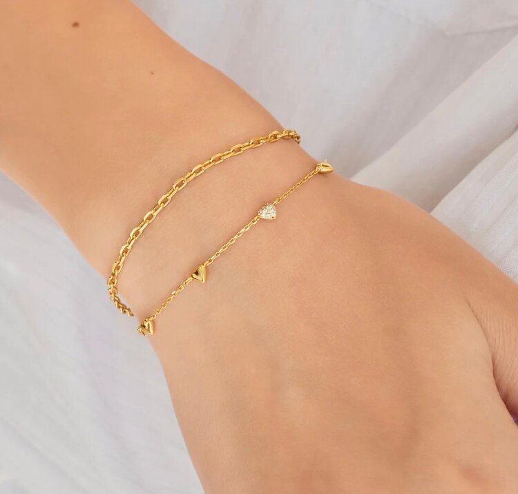 ANIA HAIE Gold Pave Puffed Heart Station Bracelet • Material: 925 Sterling Silver with 14kt Gold Plating with Cubic Zirconia • Bracelet length: 165mm with 20mm extender • Weight: 1.7g