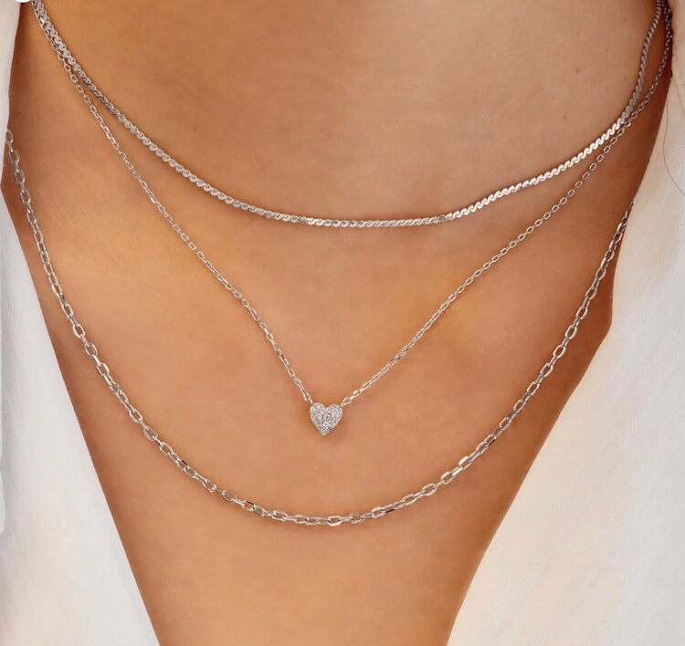 ANIA HAIE Silver Pave Heart Necklace • Material: 925 Sterling Silver with Rhodium Plating with Cubic Zirconia • Necklace length: 405mm with 75mm extender • Weight: 2.2g