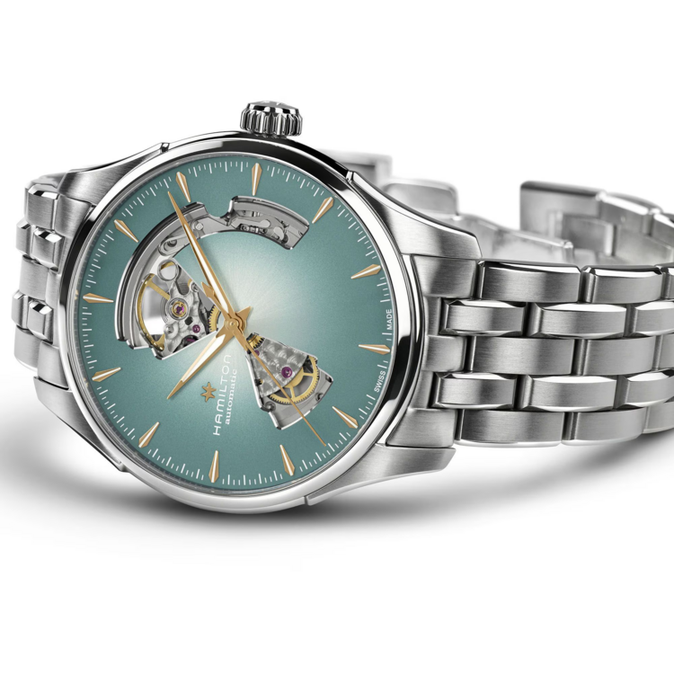 Hamilton HAMILTON JAZZMASTER OPEN HEART AUTO, Reference H32675141 Caliber H-10 Collection Jazzmaster Movement Automatic Case size 40mm Thickness (mm) 11.1 Dial color Blue Case material Stainless steel Crystal Sapphire Lug width 20mm Power reserve 80 hour