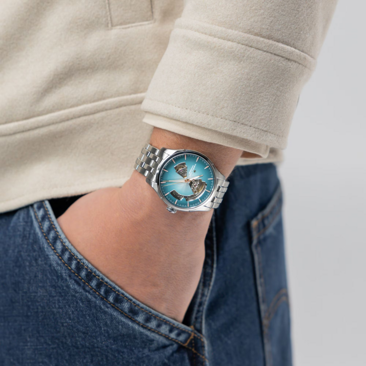 Hamilton HAMILTON JAZZMASTER OPEN HEART AUTO, Reference H32675141 Caliber H-10 Collection Jazzmaster Movement Automatic Case size 40mm Thickness (mm) 11.1 Dial color Blue Case material Stainless steel Crystal Sapphire Lug width 20mm Power reserve 80 hour