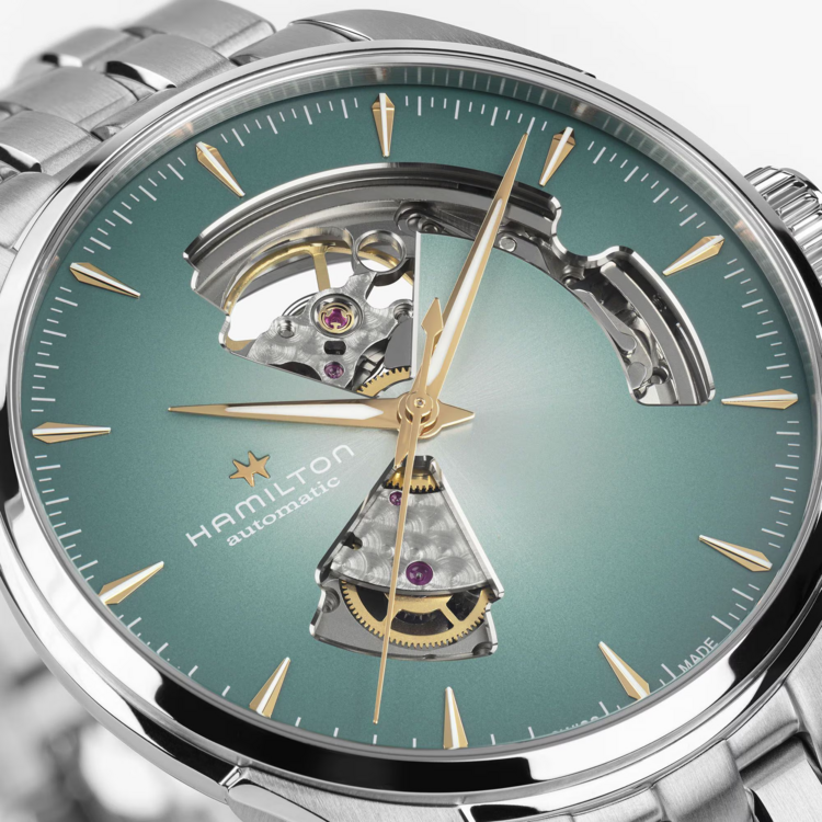 Hamilton HAMILTON JAZZMASTER OPEN HEART AUTO, Reference H32675141 Caliber H-10 Collection Jazzmaster Movement Automatic Case size 40mm Thickness (mm) 11.1 Dial color Blue Case material Stainless steel Crystal Sapphire Lug width 20mm Power reserve 80 hour