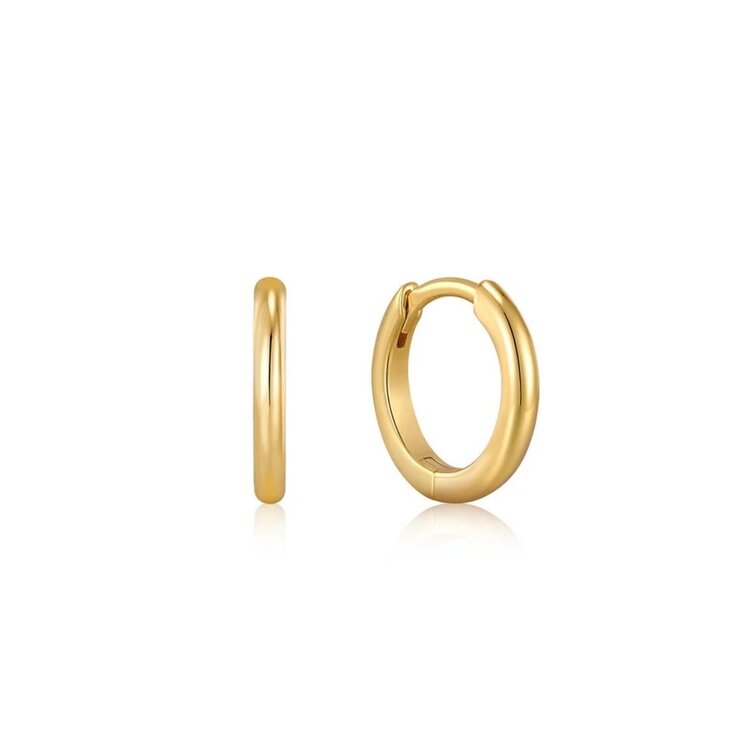 ANIA HAIE Gold Smooth Mini Huggie Hoop Earrings, Material: 925 Sterling Silver with 14kt Gold Plating • Hoop Diameter: 10mm • Weight: .9g