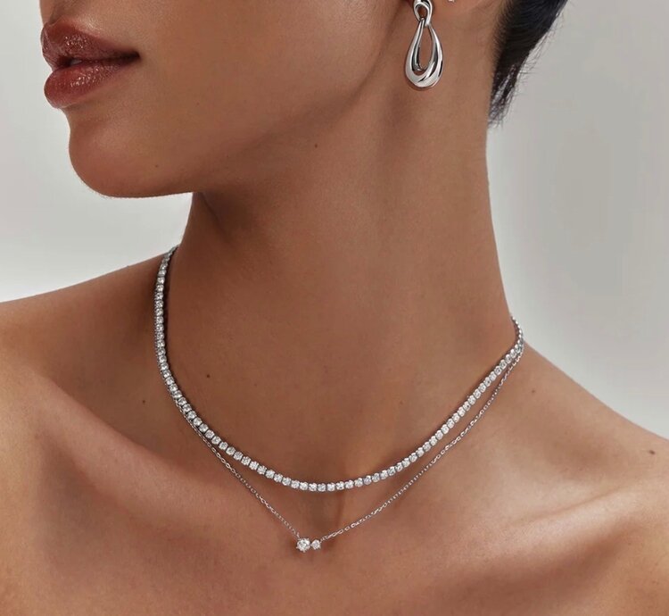 ANIA HAIE ANIA HIE Silver Half-Bezel Round Tennis Necklace, Brilliant, refined, and quietly distinctive. A tennis necklace of round cubic zirconia stones in half-bezel settings—designed to catch every sparkle. Unique enough to stand out.